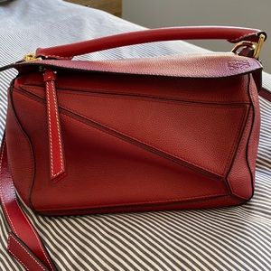 loewe small leather puzzle bag in “rouge”